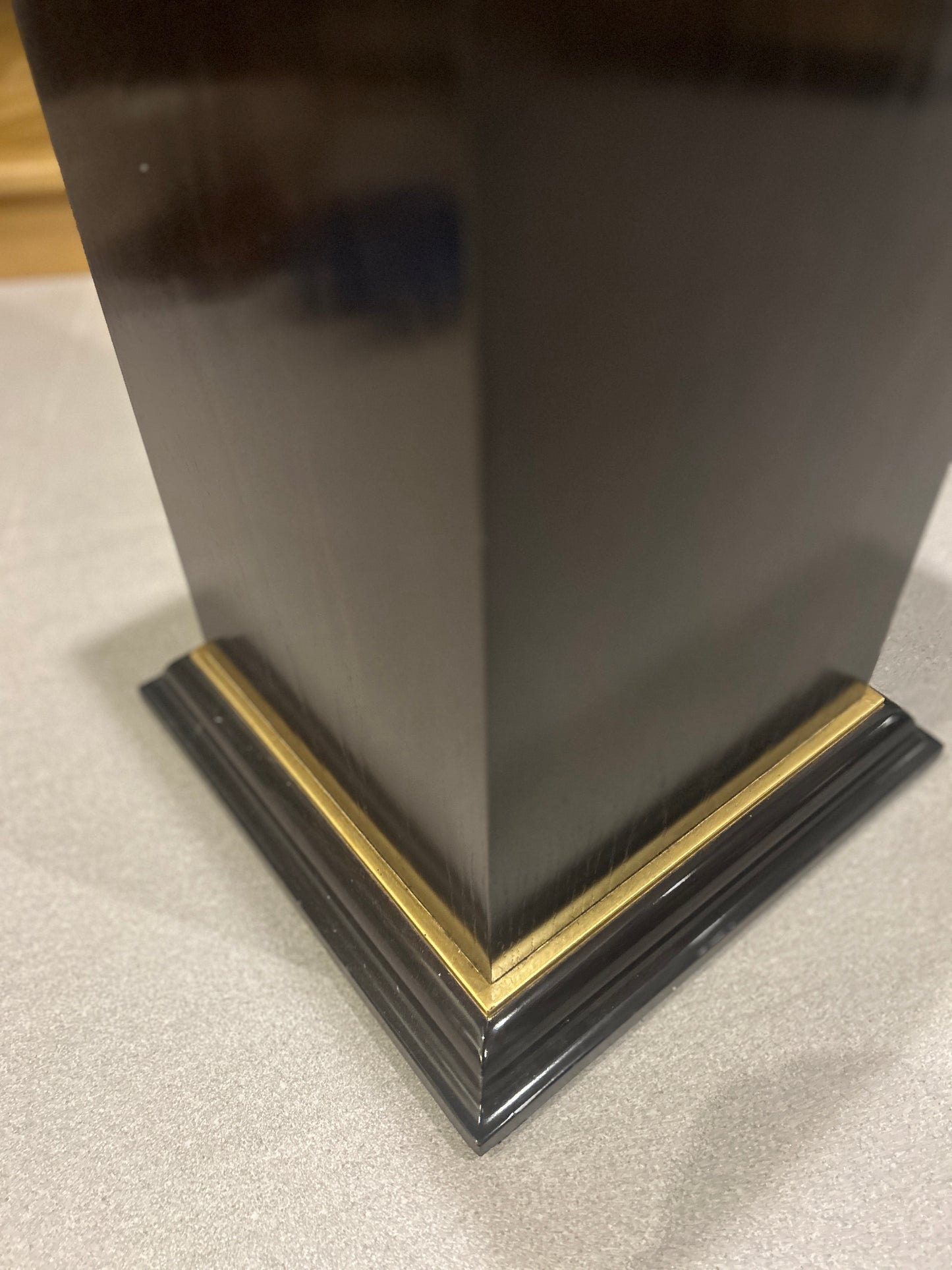 Two Contemporary dark stained ash and parcel gilt pedestals
