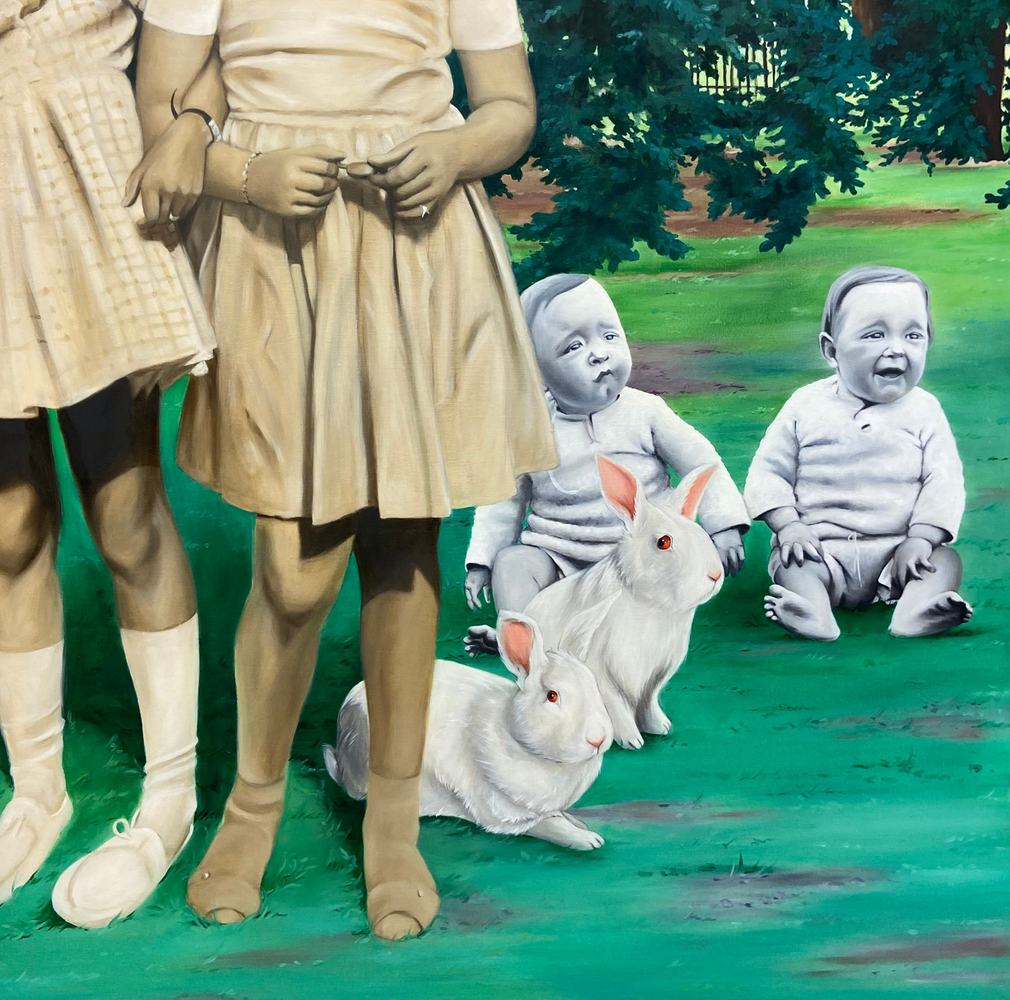 Corinne Charton - Sets of twin children, rabbits, and babies on a lawn