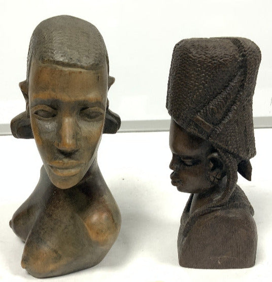 Carved wooden bust of a female with another