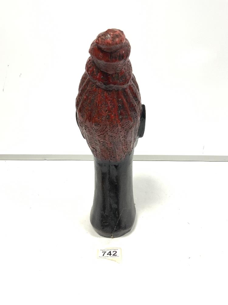 Carved african wooden bust with painted hair