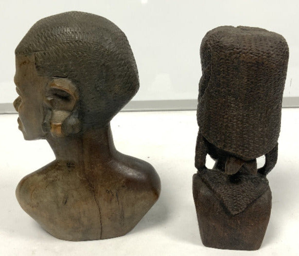 Carved wooden bust of a female with another