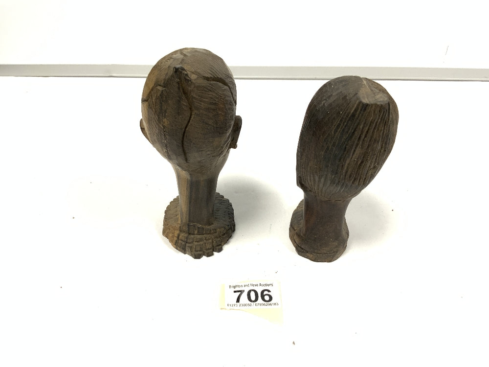 Two wooden bust carvings of women
