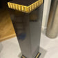 Two Contemporary dark stained ash and parcel gilt pedestals