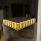 Two Contemporary dark stained ash and parcel gilt pedestals
