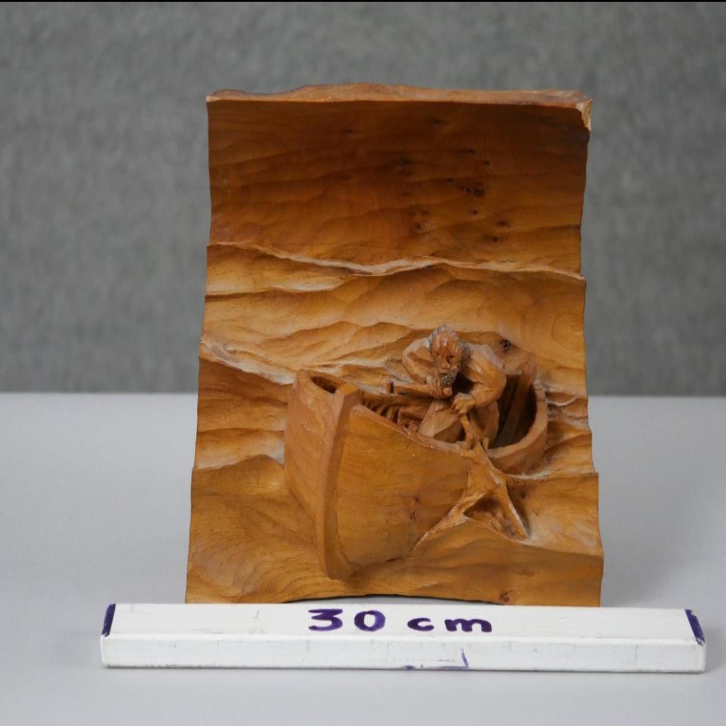 Man in a boat, vintage carved pine wood relief