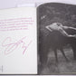 Gianni Versace: A signed copy of 'Men Without Ties'
