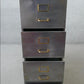 Vintage polished metal filing cabinet with brass fittings.