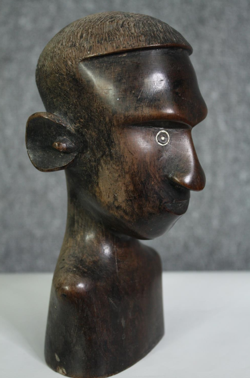 A carved African hardwood bust