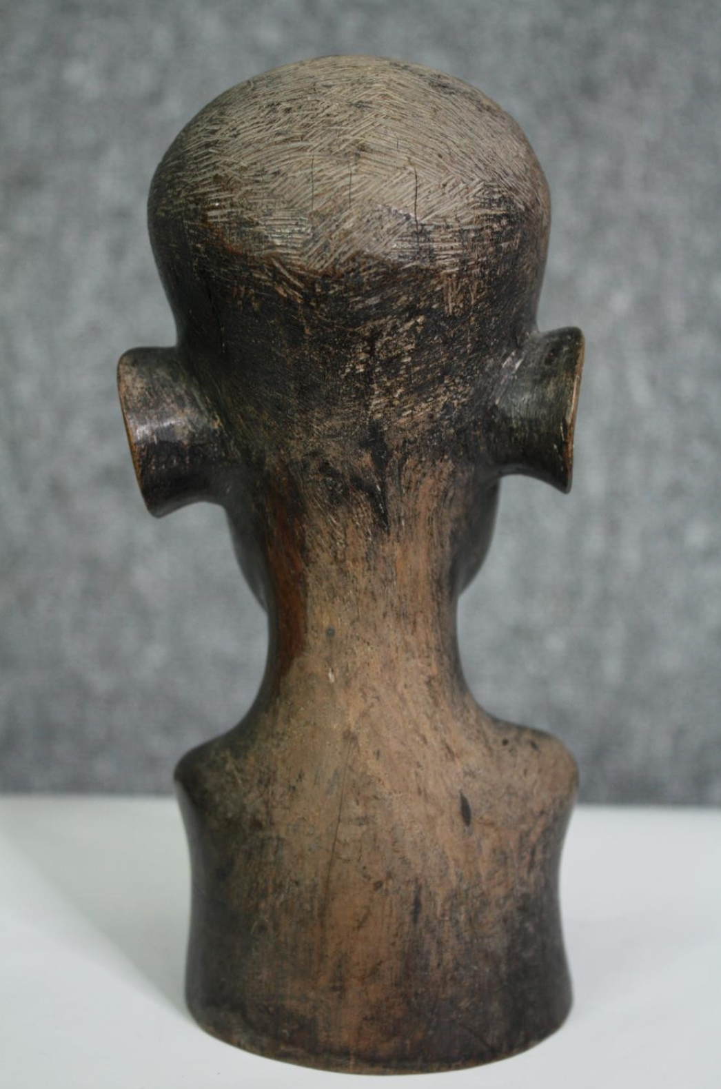 A carved African hardwood bust