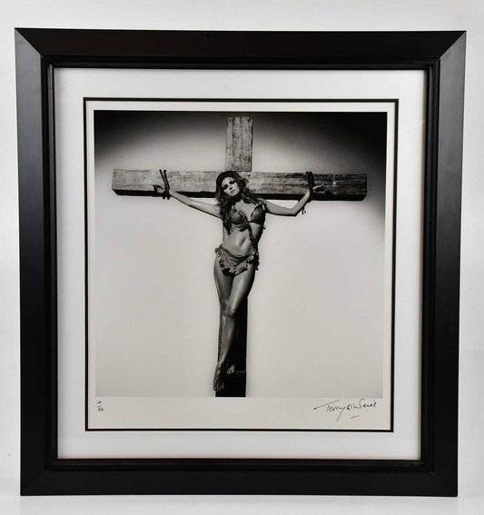 Terry O'Neill - Raquel Welch on the cross