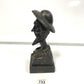 Wooden man carved with hat and beard