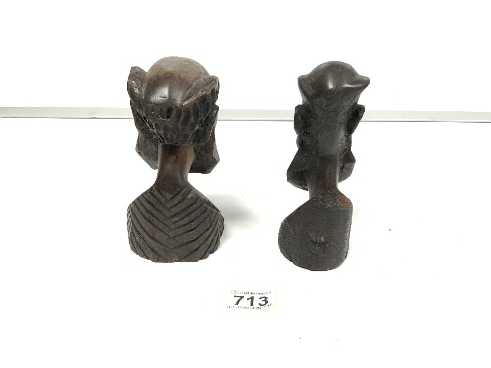 Tribal busts of male figures