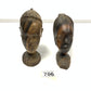 Two wooden bust carvings of women