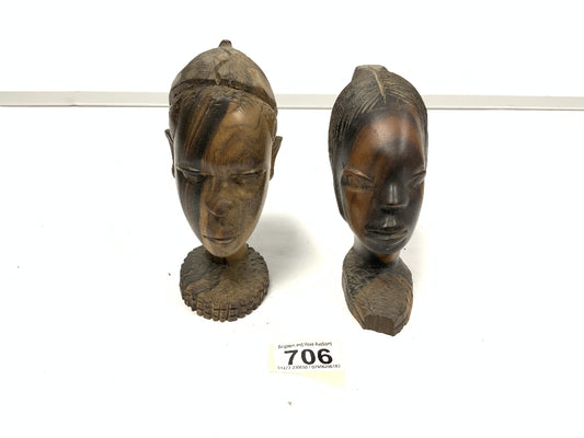 Two wooden bust carvings of women