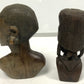 Carved wooden bust of a female with another