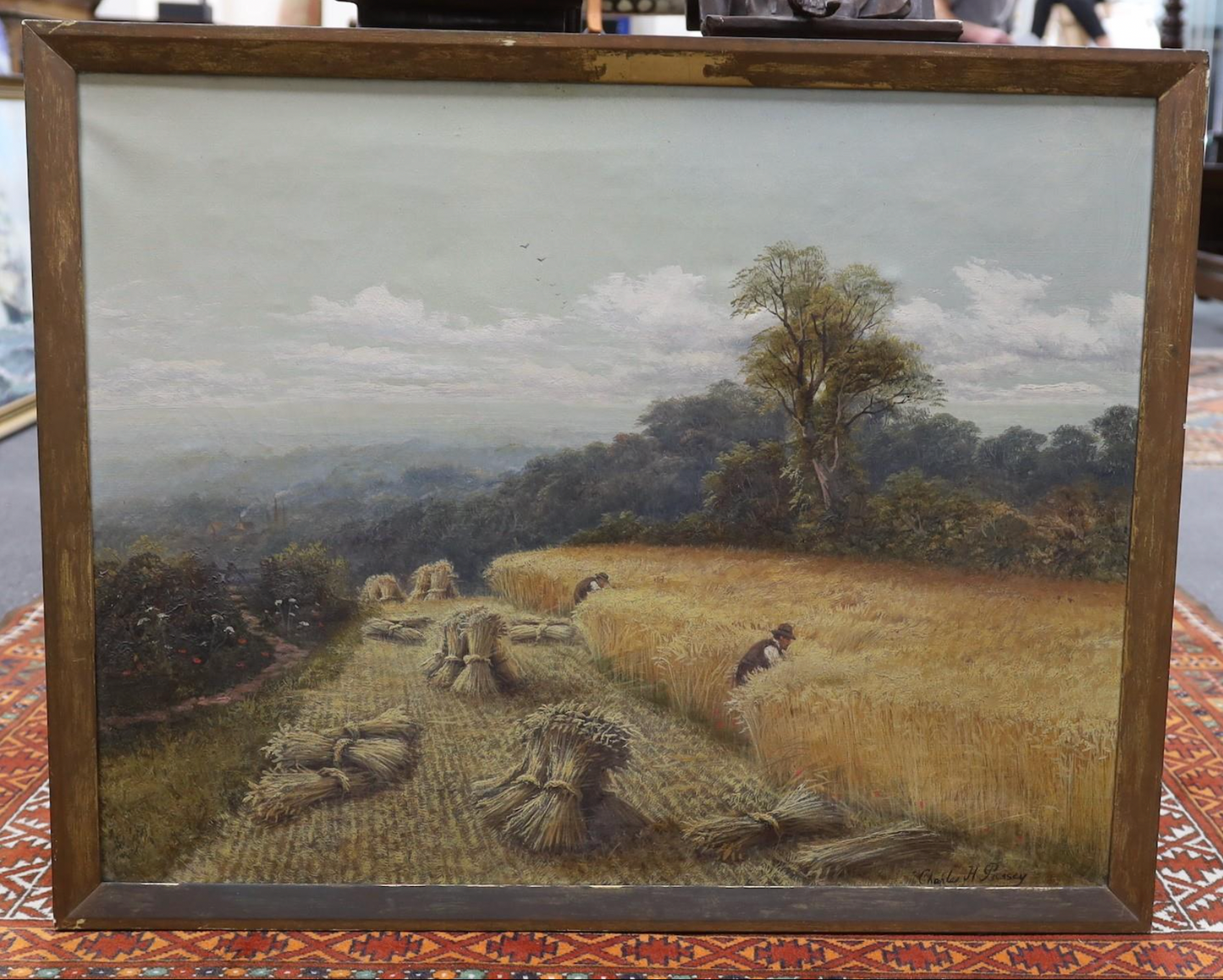 Charles Henry Passey - Harvesters in a landscape
