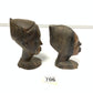 Two wooden bust carvings of women