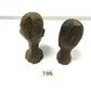 Two wooden bust carvings of women